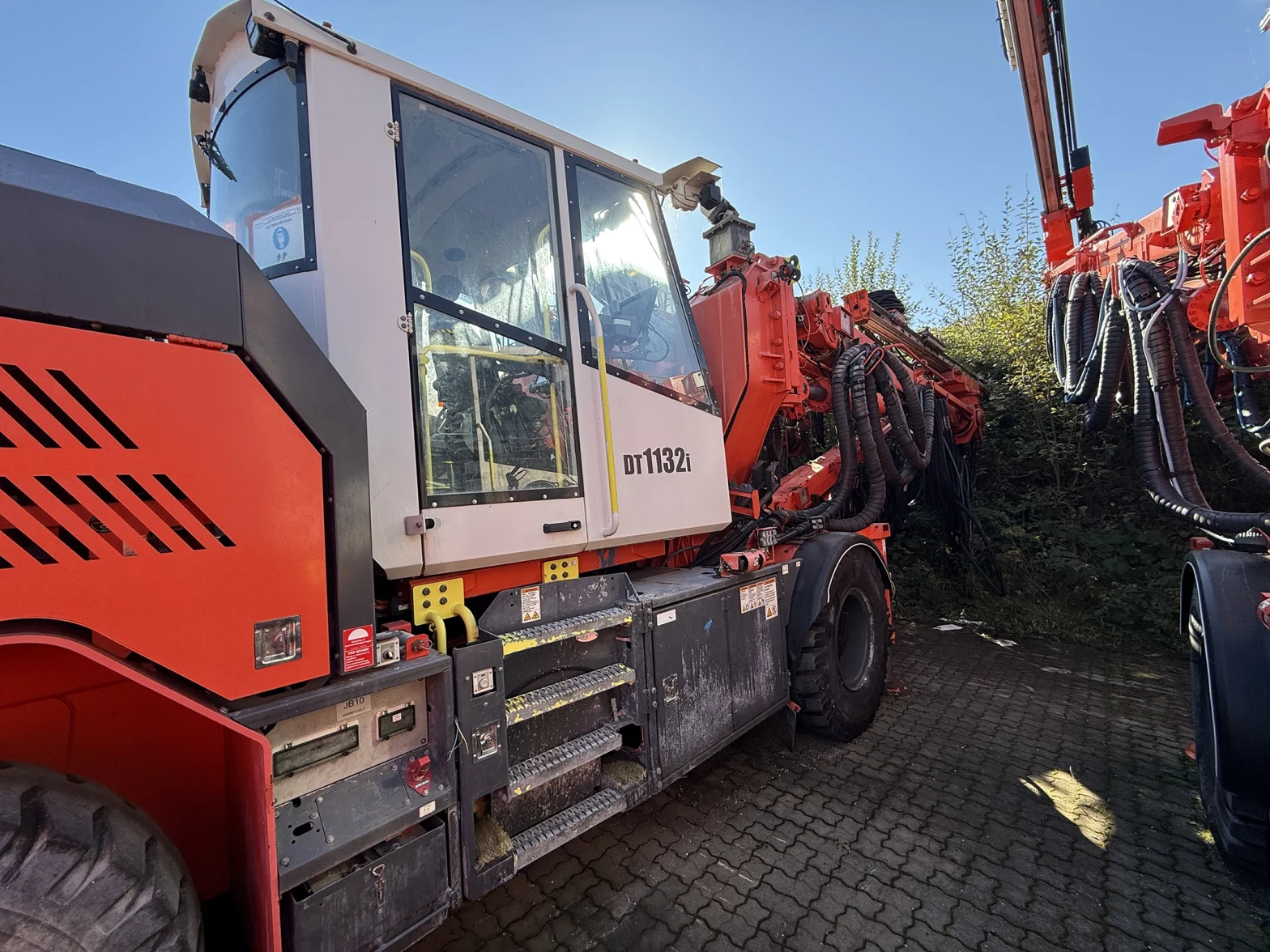 DT1132i underground jumbo drill rig for mining, tunneling, and rock support projects.